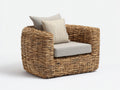 Sillón de ratán natural con cojines beige estilo artesanal diseño exterior interior 85x85x75 cm